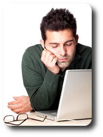 young man asleep at computer reduced horrmone levels affect men too